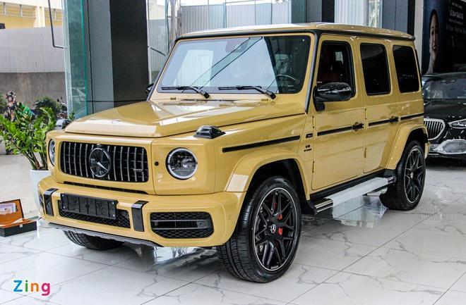 Cận cảnh Mercedes-AMG G63 màu vàng cát hiếm gặp - 1