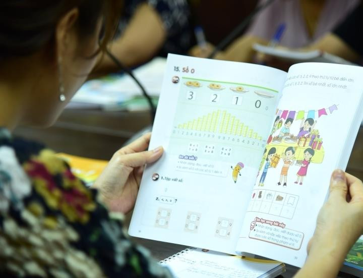 Bộ GD&ĐT yêu cầu nhà xuất bản giảm giá sách giáo khoa - 1