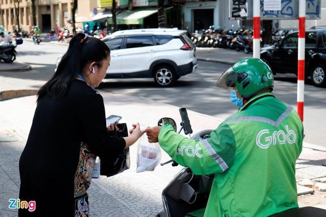 Grab thu phụ phí thời tiết nắng nóng - 1