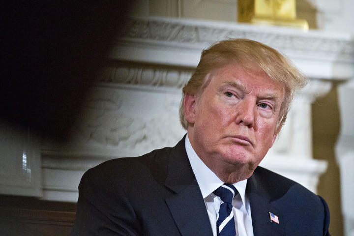 Bộ Tư pháp Mỹ nói đã trả hộ chiếu cho ông Trump - 1