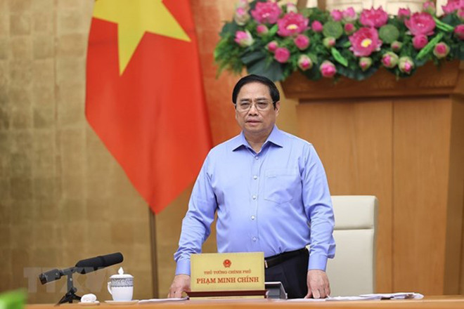 Thủ tướng: Xây dựng kịch bản tăng trưởng, lạm phát để thích ứng - 1