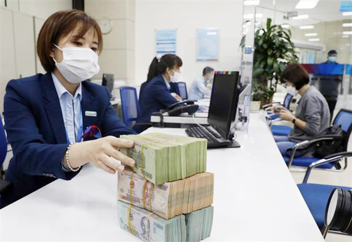 Ngân hàng Nhà nước tăng lãi suất điều hành - 1