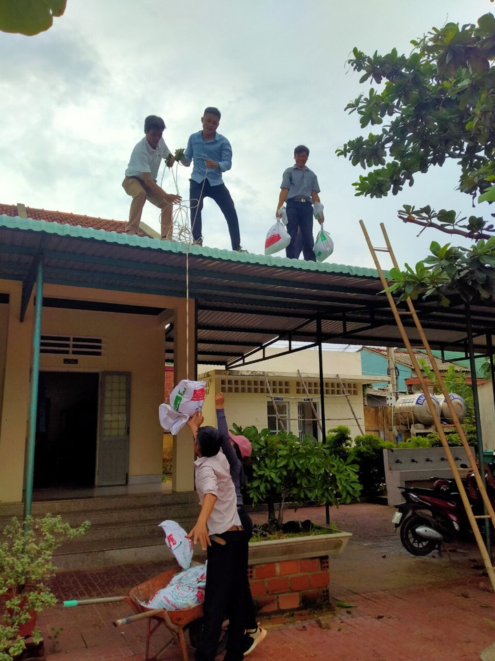 Ảnh: Người dân Bình Định chằng chéo nhà cửa, tàu thuyền ứng phó với siêu bão - 5