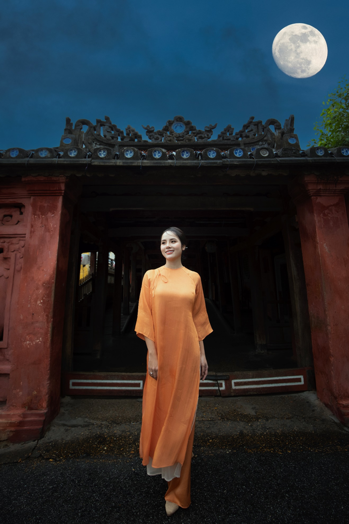 Hoa khôi Hà thành Trà My đẹp thướt tha trên phố cổ với áo dài truyền thống - 8