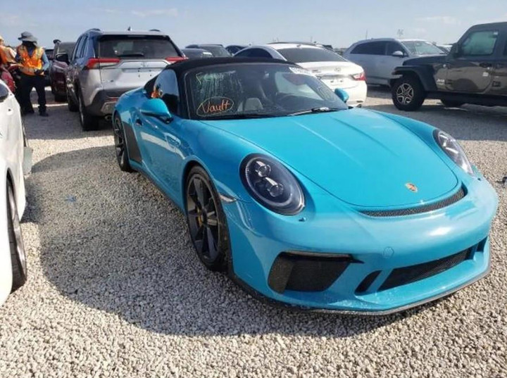 Loạt siêu xe được rao bán với mức giá khó tin sau bão lũ - 1