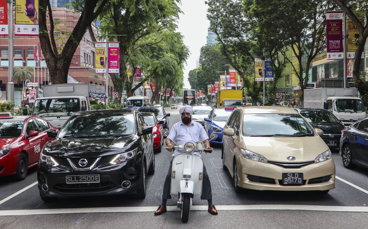 Đi xe máy ở Singapore mất phí tới 9.000 USD - 1