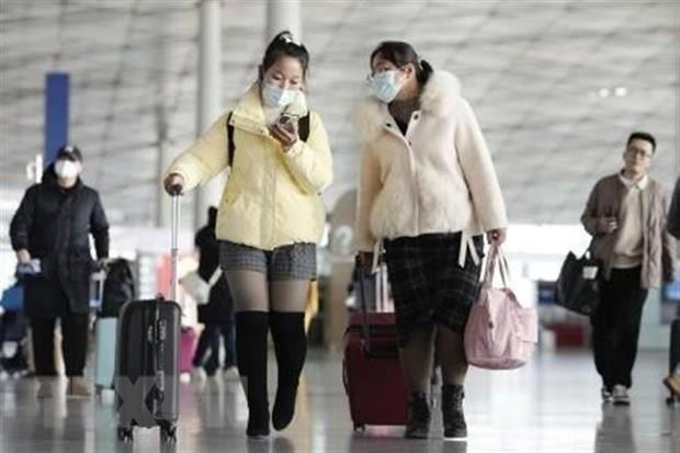 Trung Quốc bước vào giai đoạn mới kiểm soát dịch COVID-19 - 1