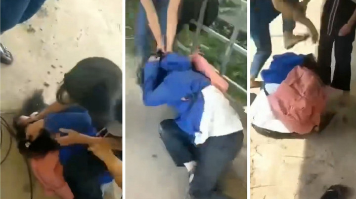 Nữ sinh lớp 6 bị đánh hội đồng: Do nói xấu nhau trên mạng xã hội - 1