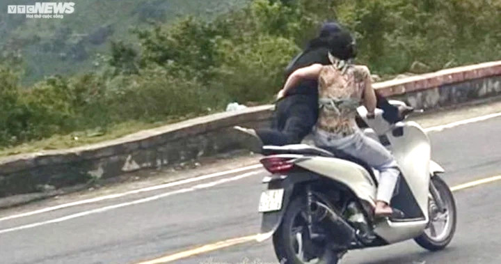 Danh tính cặp nam nữ đi SH 'làm xiếc' tại khúc cua nguy hiểm trên đèo Hải Vân - 2