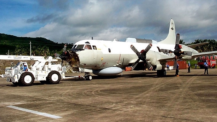 Sự cố Hải Nam: Bị cấm bay, Mỹ phải tháo rời máy bay để mang về - 2