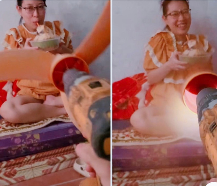 Dùng máy khoan để lắp cánh quạt làm mát cho vợ bầu - khó thế mà cũng nghĩ ra. Lưu ý là bạn không nên bắt chước cách này vì nó có thể gây nguy hiểm. (Ảnh: Nguyễn Phương)