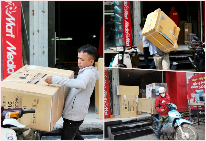 Hà Nội: Bán điều hòa, quạt máy kiếm bộn tiền mùa nắng nóng - 1