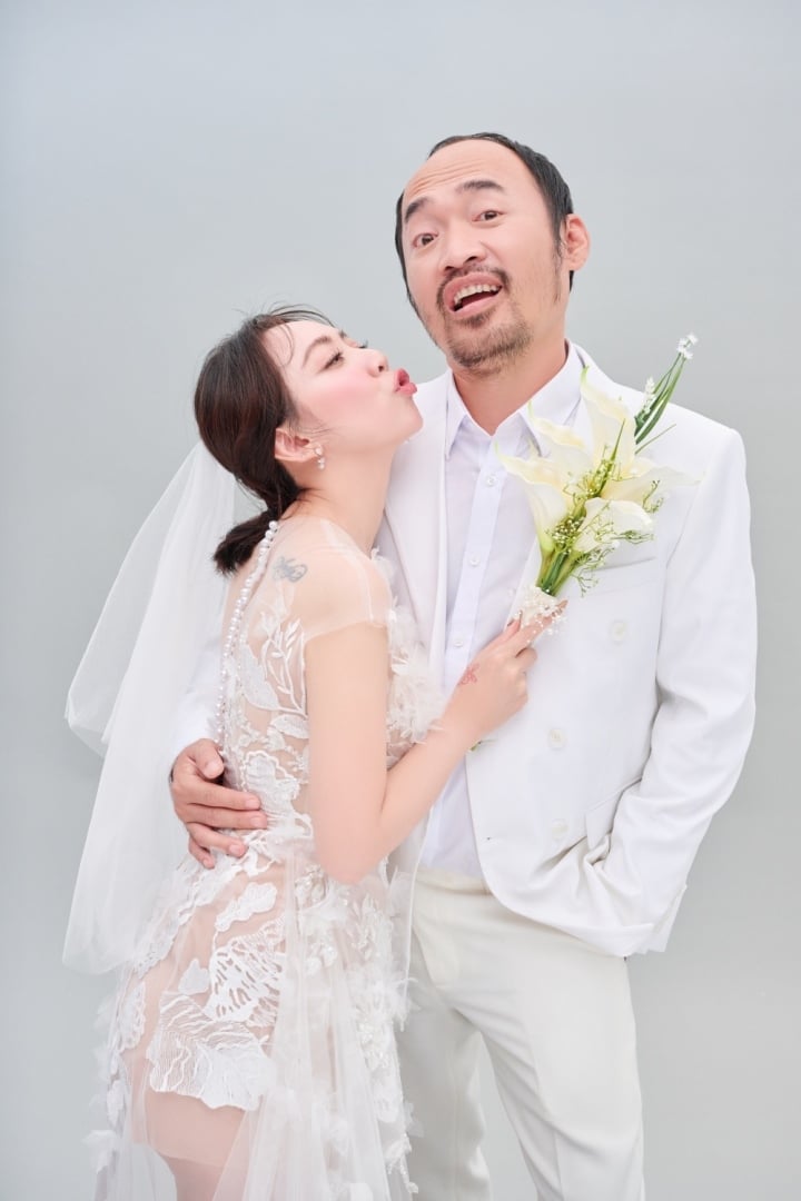 Vợ chồng Thu Trang - Tiến Luật chụp ảnh cưới cùng quý tử điển trai - 5