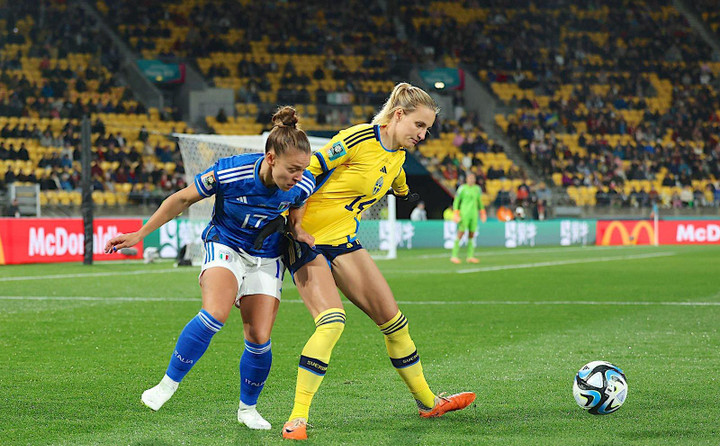 Đội tuyển Italy (áo xanh) thi đấu tốt.