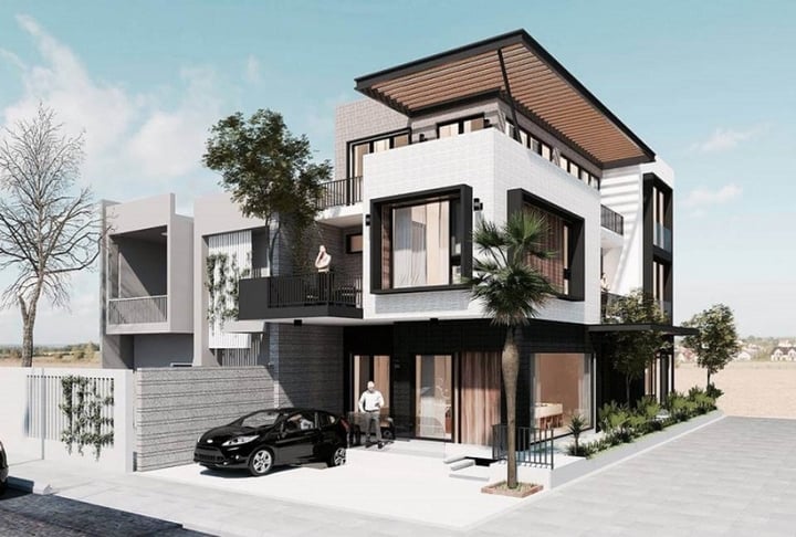 Nhà phố vừa ở vừa kinh doanh sở hữu 2 mặt tiền với diện tích và vị trí lý tưởng. Hàng cây xanh bên ngoài vừa tạo không gian xanh, vừa thu hút sự chú ý của khách qua đường. (Ảnh: Kientrucauchau)