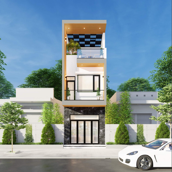 Nhìn từ xa, mặt bằng nhà ống 3 tầng phố hiện đại và nổi bật hơn hẳn những công trình cùng thiết kế. Với phối cảnh mặt tiền rộng 5m, đủ để kiến trúc sư sáng tạo, tạo nên một phối cảnh mặt tiền ấn tượng.