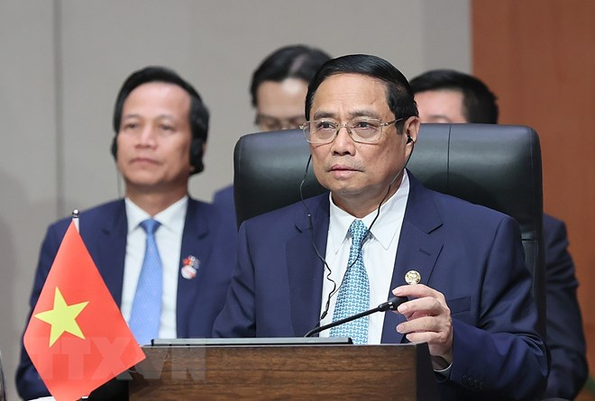 Thủ tướng Phạm Minh Chính phát biểu tại Hội nghị Cấp cao ASEAN-Ấn Độ lần thứ 20. (Ảnh: Dương Giang/TTXVN)