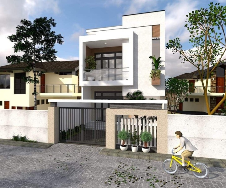 Thiết kế nhà ở 2 tầng 4 phòng ngủ sử dụng cửa kính lớn đến đón ánh sáng tự nhiên làm cho không gian được thoáng đãng. Phía bên ngoài ngôi nhà có vài chậu cây xanh mát, giúp trang trí cho nhà được đẹp và gần gũi với thiên nhiên hơn.