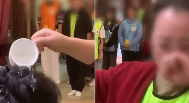 Nữ nhân viên không đạt KPI bị tất cả đồng nghiệp dội nước lên đầu.