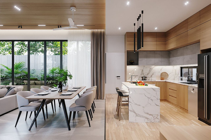 Thiết kế phòng khách liền bếp tuy trông rất đơn giản nhưng các kiến trúc sư đã áp dụng một số cách phân chia “ngầm định” giữa 2 không gian nhưng vẫn giữ được sự tự nhiên, tính riêng tư của 2 khu vực để không bị ảnh hưởng nhau.