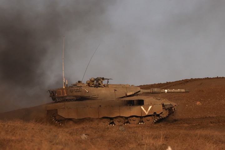 Xe tăng Israel trong cuộc tập trận quân sự ở Cao nguyên Golan ngày 2/11. (Ảnh: Reuters)