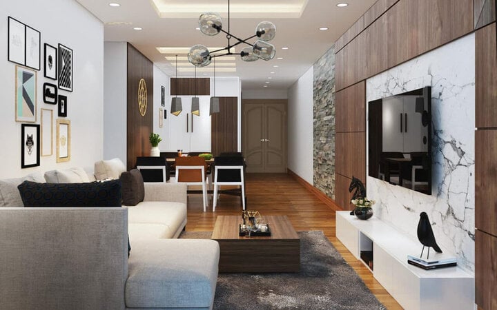 Bạn có thể tạo ra không gian mở cho phòng khách căn hộ nhỏ bằng cách phá bỏ những vách ngăn giữa phòng khách và bếp. Không còn vách ngăn, không gian sẽ thoáng và rộng rãi hơn.