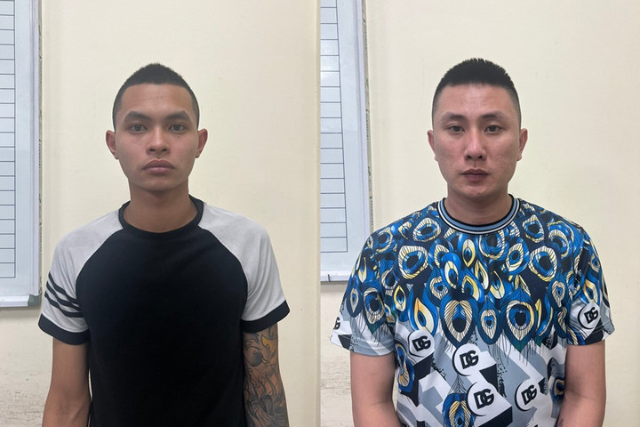 Lê Văn Nam và Lương Ngọc Lâm tại cơ quan công an.