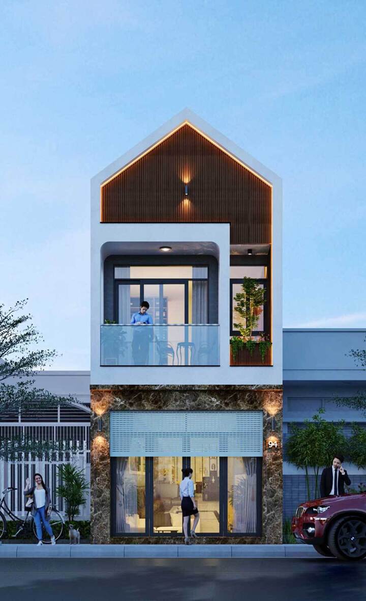 Ngôi nhà có tone màu trắng chủ đạo kết hợp gam màu nâu của gỗ mộc mạc, không quá nổi bật nhưng vẫn toát lên vẻ đẹp cách tân và trang nhã. Tầng trệt được kiến trúc sư ốp đá vân mây màu trầm ấm giúp tăng hiệu ứng thẩm mỹ.