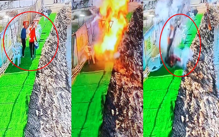 Khoảnh khắc người đàn ông (áo màu cam) biến thành quả cầu lửa khiến mọi người khiếp đảm.