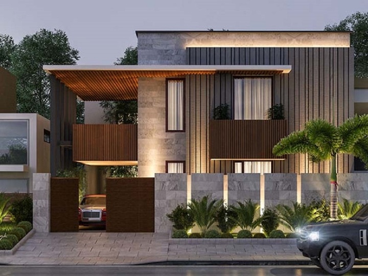 Nhìn thoáng qua mẫu nhà vuông 2 tầng này chúng ta đã thấy rõ sự bề thế, sang trọng và đẳng cấp của gia chủ. Ngôi nhà càng thêm ấn tượng nhờ sự phá cách trong việc sử dụng đá ốp tường cũng như cách tạo họa tiết trên diện tường. Ngôi nhà như được khoác lên mình chiếc áo choàng đầy sức hấp dẫn.