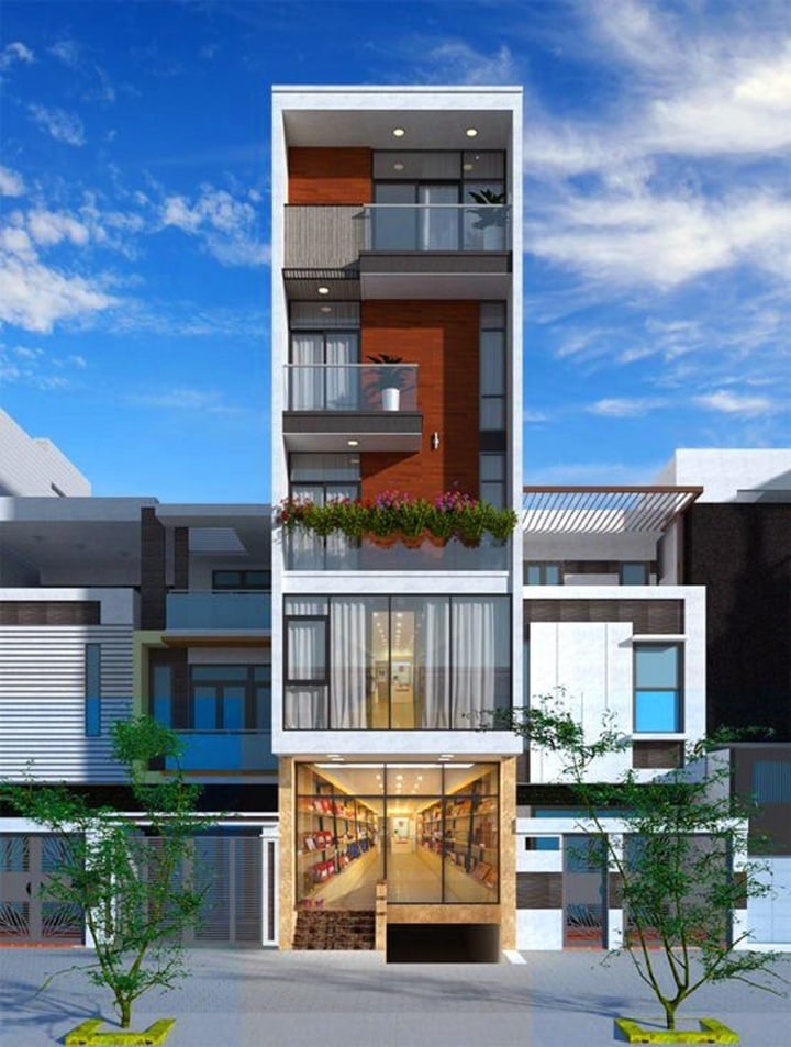 Mẫu thiết kế nhà phố 5 tầng sử dụng tối đa kính cường lực ở mặt tiền tầng 1 và tầng 2. Nhờ vậy cửa hàng nổi bật với nét sang trọng hiện đại. Khách hàng dễ dàng quan sát các sản phẩm từ xa và ghé vào cửa hàng. (Ảnh: Thietkenhadephaiphong)