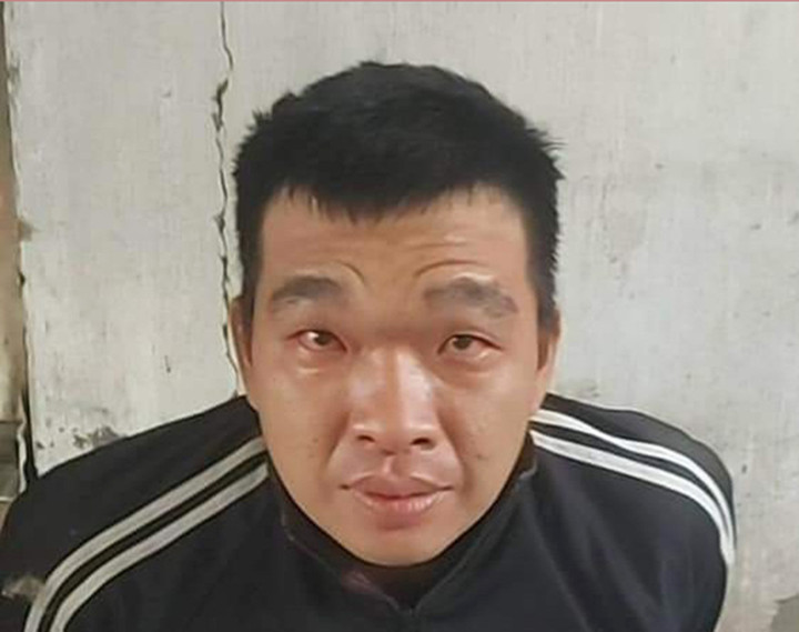 Huỳnh Minh Trí lúc bị bắt.