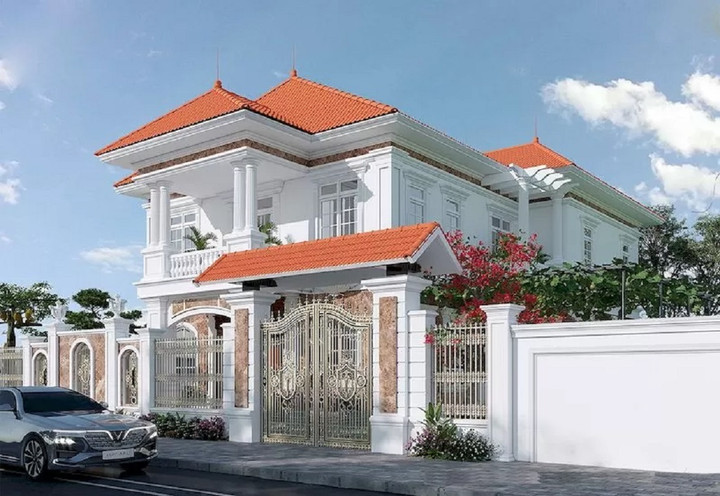 Mẫu biệt thự 2 tầng với chi phí xây dựng khoảng 1 tỷ có mái đỏ tươi và màu trắng chủ đạo được lựa chọn cho hầu hết các mẫu biệt thự bởi chúng khiến kiến trúc trông rộng rãi và mát mẻ hơn. Màu trắng cũng là một màu đặc trưng của phong cách này. (Ảnh: Vinavic)