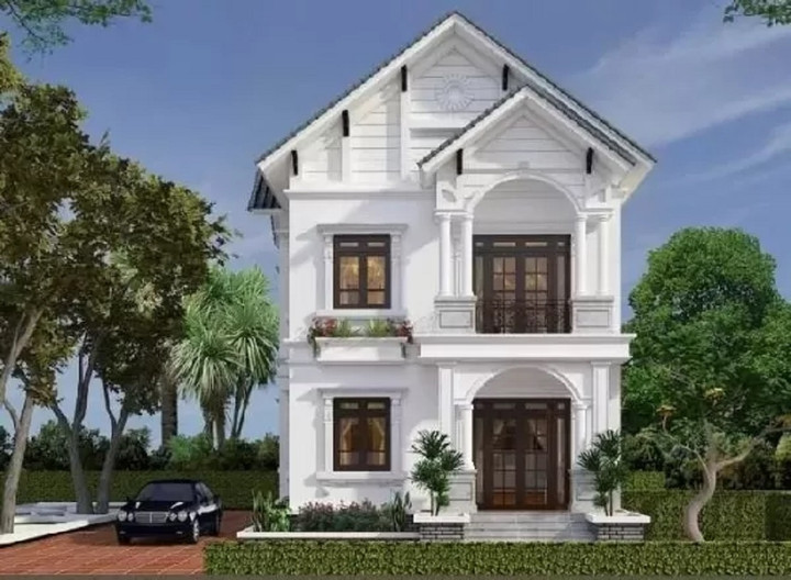 Mẫu nhà 2 tầng giá 1 tỷ với màu trắng chủ đạo kết hợp cùng các ô cửa kính lấy sáng khiến ngôi nhà nổi bật hơn. (Ảnh: Vinavic)