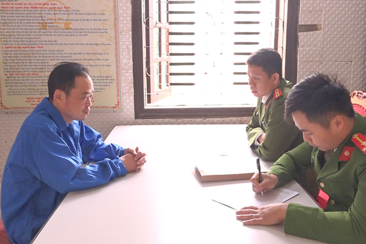 Vũ Tiến Cảnh tại cơ quan công an. (Ảnh: CACC)