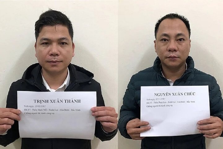 Trịnh Xuân Thành và Nguyễn Xuân Chúc tại cơ quan công an. (Ảnh: C.A)