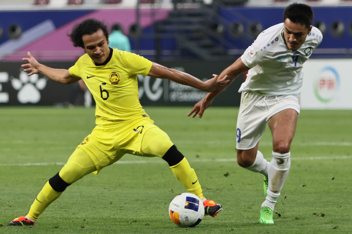 U23 Malaysia (áo vàng) thua U23 Uzbekistan.