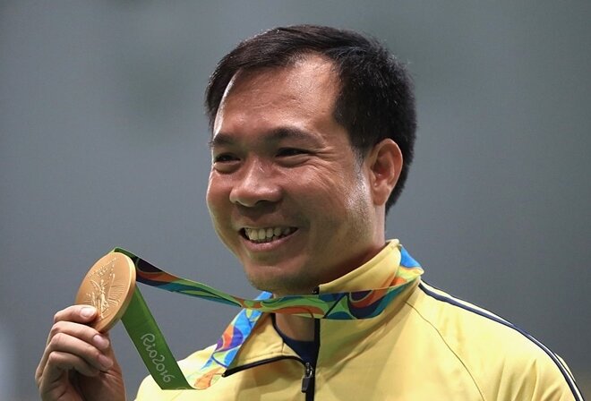 Hoàng Xuân Vinh đã thi đấu bằng suất mời của Ủy ban Olympic quốc tế tại Olympic 2020