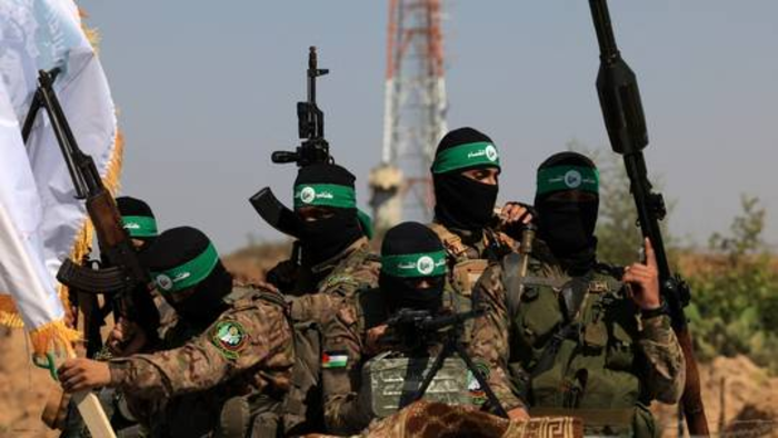 Các chiến binh Palestine của Lữ đoàn al-Qassam thuộc cánh vũ trang Hamas.(Ảnh: Getty)