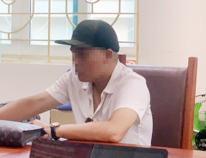 Ngô Mạnh C. tại cơ quan công an.