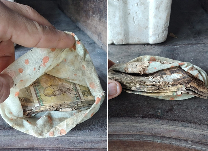 Tập tiền 1.000 đồng được xếp ngay ngắn trong chiếc túi vải của người bà.