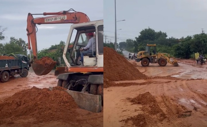 Xe múc, xe ủi được huy động tới hiện trường để khắc phục hậu quả (Ảnh: Thái An)