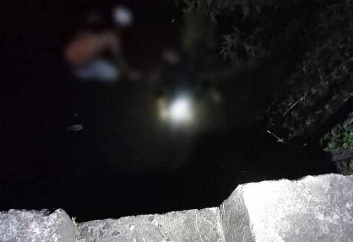 Trong đêm, người dân địa phương phát hiện thi thể người đàn ông dưới sông Tiên. (Ảnh: Đ.C)