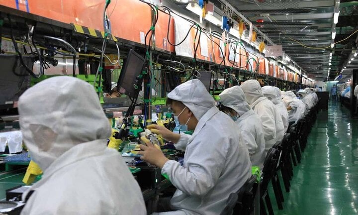 Một dây chuyền lắp ráp thiết bị điện tử của Foxconn tại Trịnh Châu. (Ảnh: Global Times)