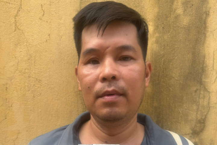 Trần Xuân Hùng tại cơ quan công an. (Ảnh: CACC)