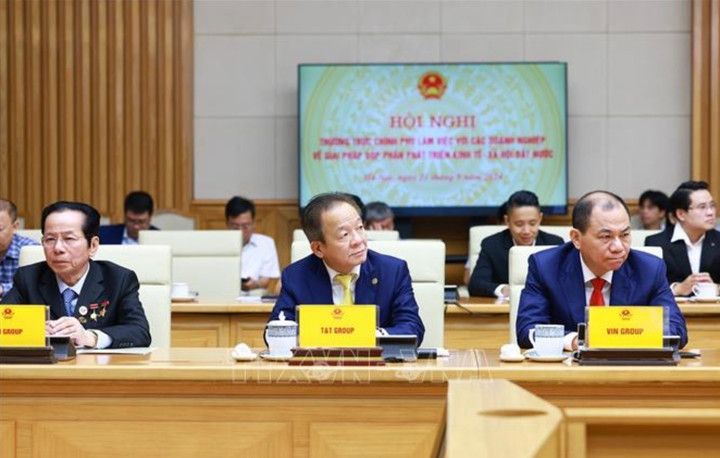 Lãnh đạo các doanh nghiệp tham dự hội nghị. (Ảnh: Dương Giang/TTXVN)