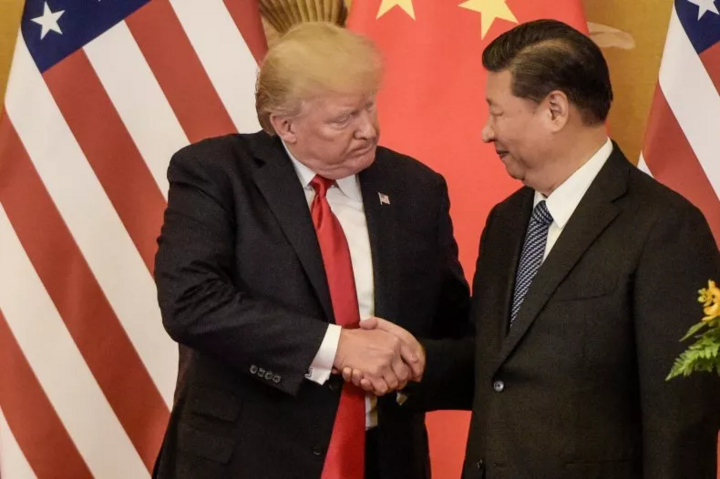 Cựu Tổng thống Mỹ Donald Trump (trái) và Chủ tịch Trung Quốc Tập Cận Bình tại Bắc Kinh, ngày 9/11/2017. (Ảnh: Getty Images)