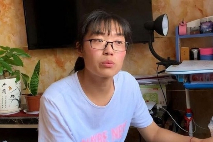 Trần Xuân Tú - người từng bị cướp suất vào đại học 20 năm trước. (Nguồn ảnh: NetEase)