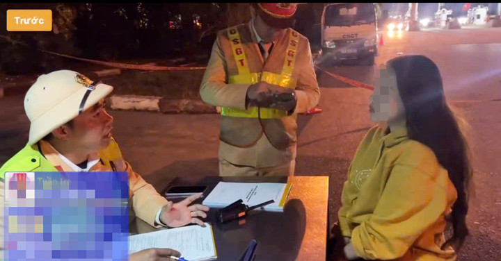 Lực lượng CSGT lập biên bản đối với nữ tài xế lái xe ngược chiều trên cao tốc Nội Bài - Lào Cai.