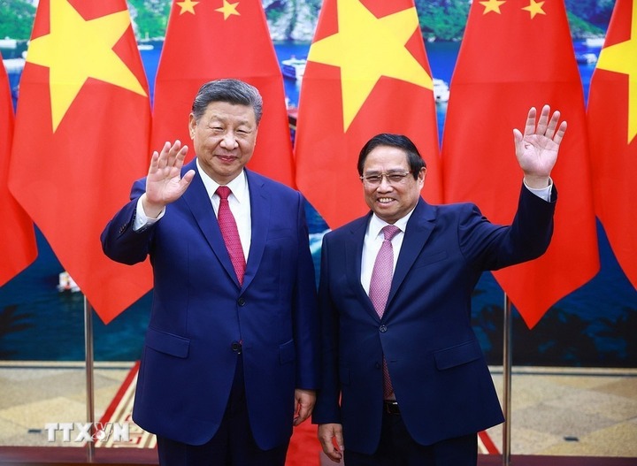 Thủ tướng Phạm Minh Chính hội kiến Tổng Bí thư, Chủ tịch Trung Quốc Tập Cận Bình. (Ảnh: Dương Giang/TTXVN)